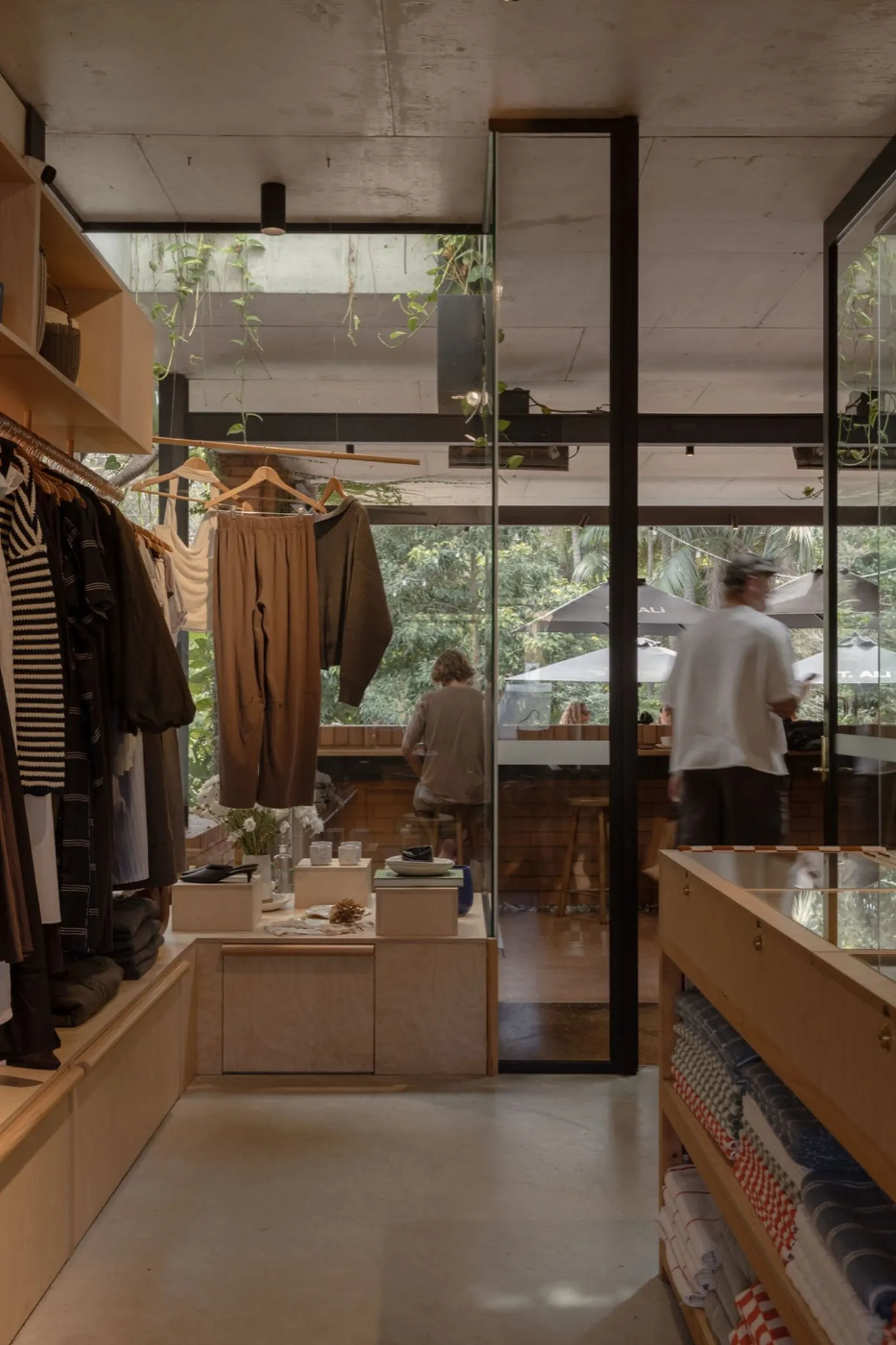 Neutral-toned fashion rail at Kind Curations, Tugun